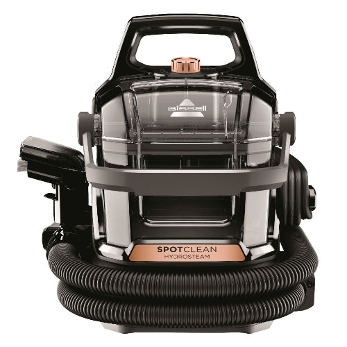 A Bissell Spotclean Hydrosteam Portable Deep Cleaner, with a transparent water tank, black body and silver accents.