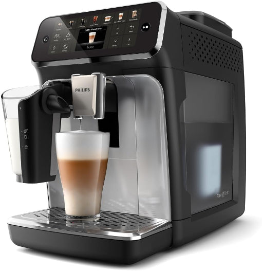 Philips coffee machine with a glass of layered coffee on a white background
