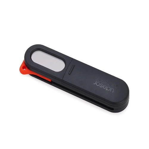 Black and red kitchen tool with 'Joseph Joseph' branding on a white background