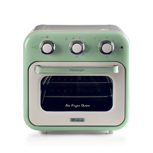 Green air fryer oven with vintage design on a white background