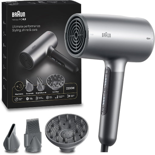 Braun hair dryer with attachments and packaging on a white background