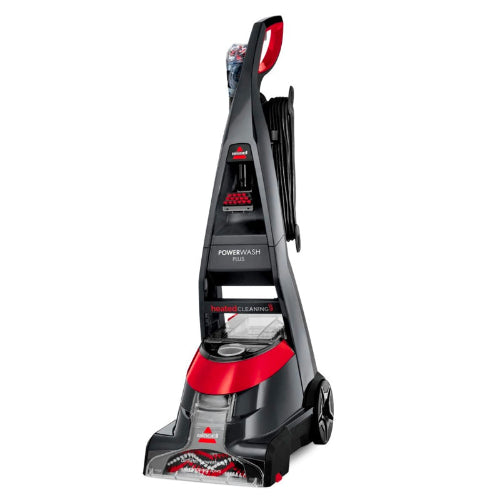 Bissell Powerwash Plus Upright Carpet Washer with a black and red color scheme, showing the machine's foot, handle, and cleaning brushes.