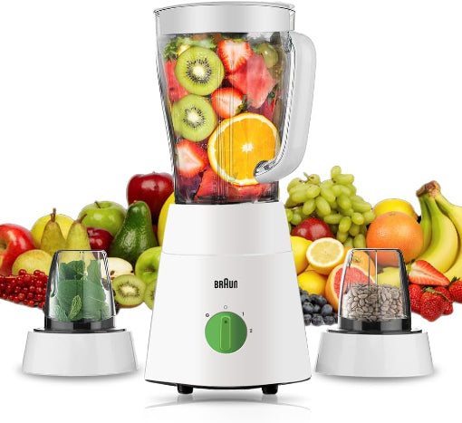 A white Braun jug blender with 4 blades, displayed alongside fruits and vegetables such as bananas, oranges, and berries, indicating its use for making smoothies.