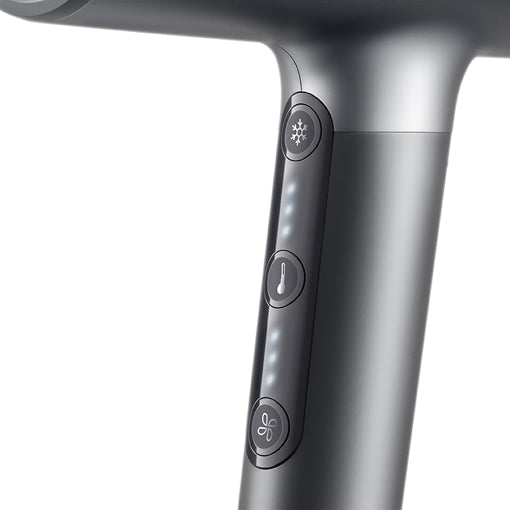 Close-up of a hair dryer handle with control buttons on a white background